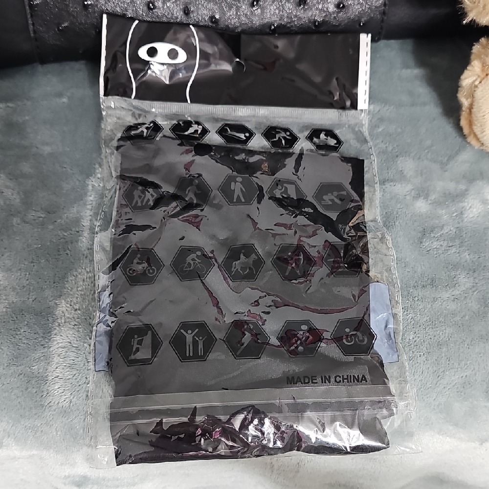 Unopened Black Face Mask.
